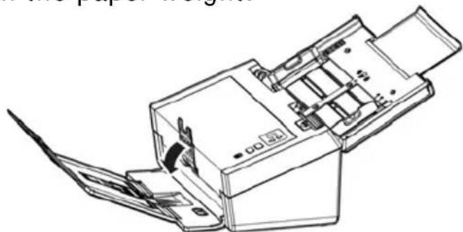 Line drawing of a mechanical device with internal components and a tool inserted (no text or symbols)