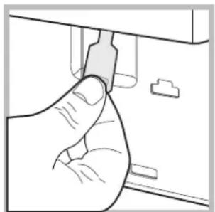 Hand holding a small electronic component, no visible text or symbols