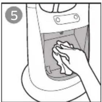 Hand cleaning a kitchen appliance with a cloth (no text or symbols visible)