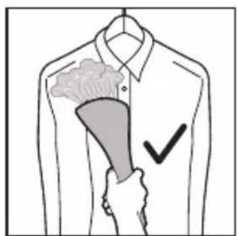Diagram showing a hand holding a shaded object with a checkmark, likely illustrating a medical or health procedure.