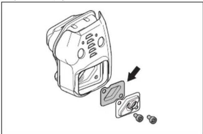 Exploded view diagram of a device showing internal components and a downward arrow indicating assembly (no text or symbols present)