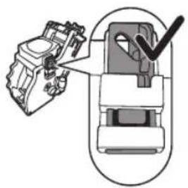 Mechanical assembly diagram showing a component being inserted into a housing (no text or symbols visible)