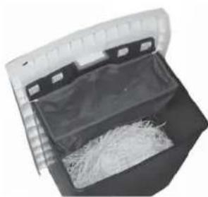 Close-up of a plastic bag with a partially open lid and loose material inside (no visible text or symbols)