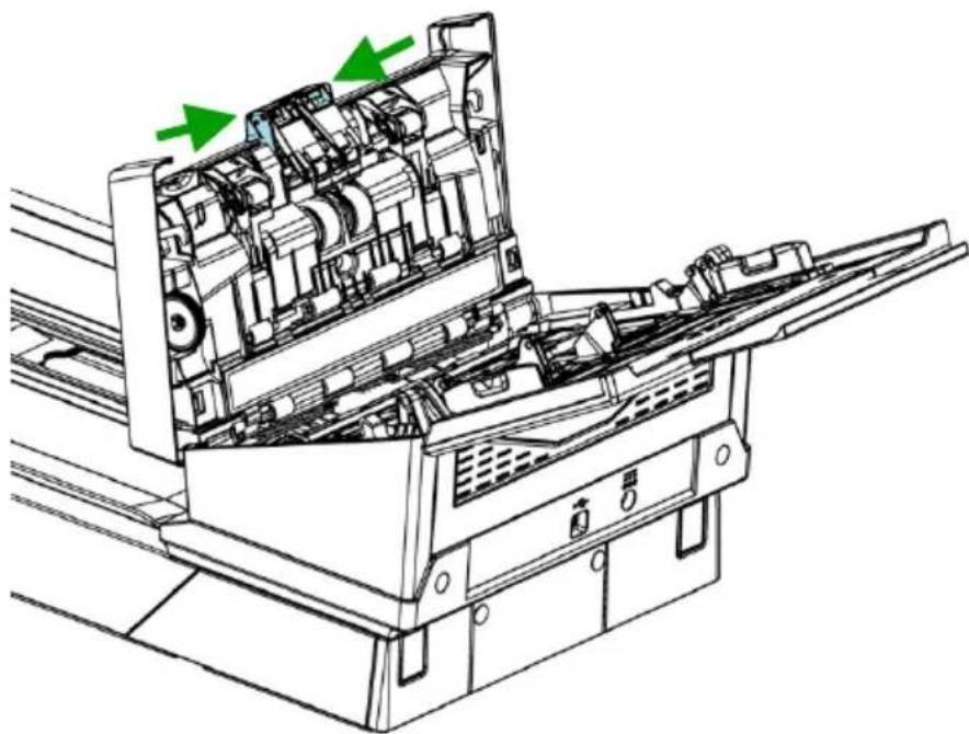 Technical line drawing of an open industrial machine with internal components and green directional arrows indicating flow or movement (no text or symbols present)