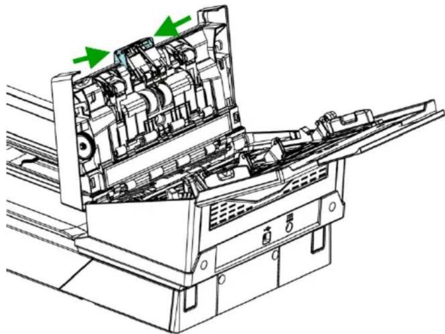 Technical line drawing of an open industrial machine with internal components and green directional arrows indicating flow or movement (no text or symbols present)