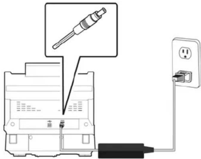Diagram showing a disassembled electrical component connected to an electrical outlet, with a magnified view of the component being inserted.