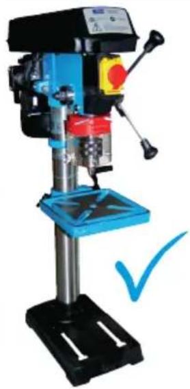 Blue and black industrial drill press with a checkmark indicating inspection (no visible text or symbols)
