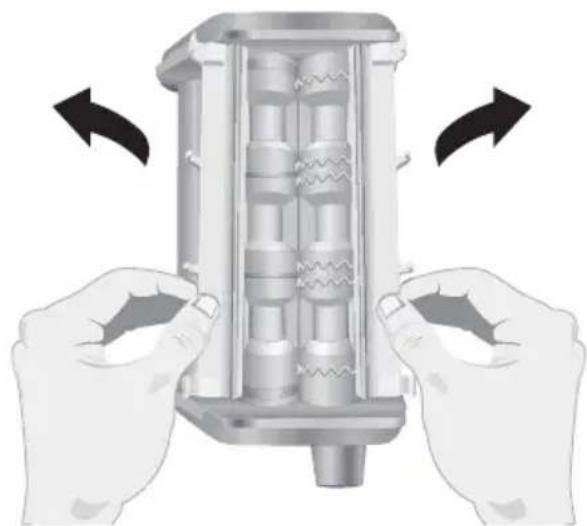 Illustration of two hands assembling a mechanical component with arrows indicating rotation (no text or symbols)
