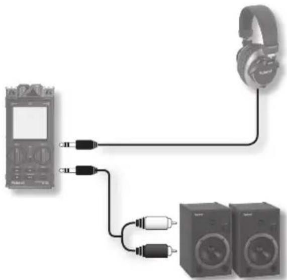Diagram showing audio recording setup with headphones, a recording device, and two speakers (no text or labels)