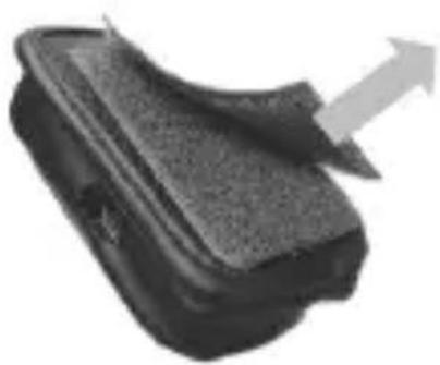 Close-up of a textured, layered object with an arrow pointing upward (no visible text or symbols)
