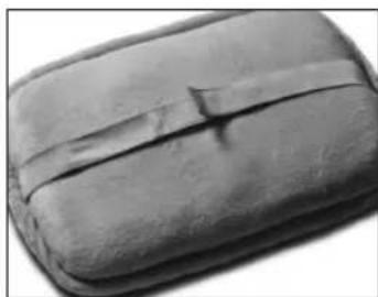 Close-up of a dark, textured object with a rectangular band and a small protrusion (no visible text or symbols)