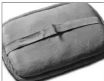 Close-up of a dark, textured object with a visible crack or indentation (no text or symbols)