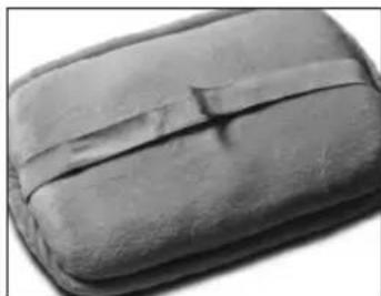 Close-up of a dark, textured object with a visible crack or indentation (no text or symbols)