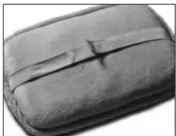 Close-up of a dark, textured object with a small mark on the side (no visible text or symbols)