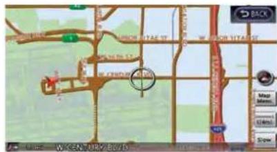 Screenshot of a map interface showing street names, road networks, and a marked location with a green circle.
