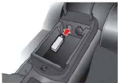 Interior view of a car intake tray with a red arrow pointing to a component (no text or symbols visible)