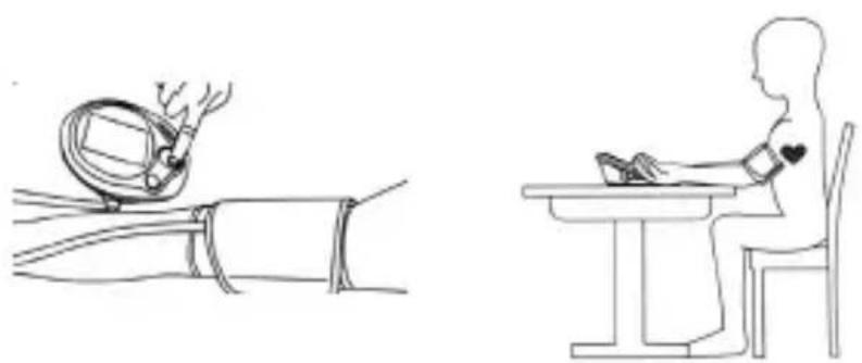 Line drawing showing a person using a heart-shaped device to interact with another person at a table (no text or symbols present).