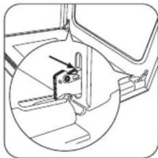 Technical line drawing of a mechanical assembly with a circular inset showing a bracket and a tool (no text or symbols)