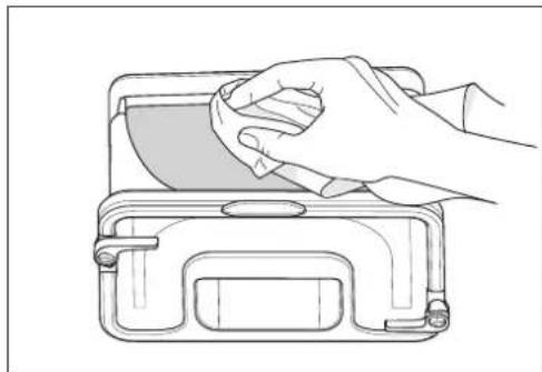 Line drawing of a hand cleaning a small container with a cloth (no text or symbols)