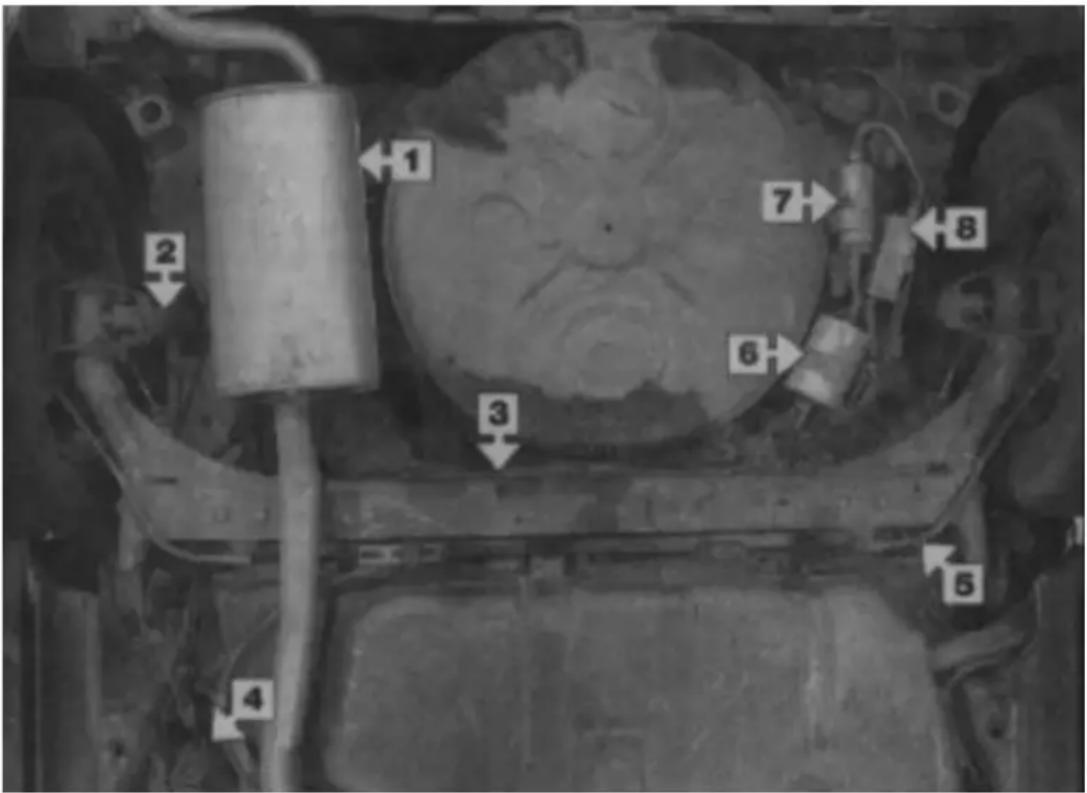 Technical diagram of a vehicle engine component with numbered parts and directional arrows indicating parts of the body.
