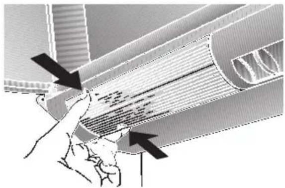 Illustration of a hand pressing down on a curved panel or tube, with arrows indicating force direction (no text or symbols present)