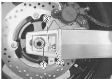 Mechanical assembly diagram with numbered components and labeled parts