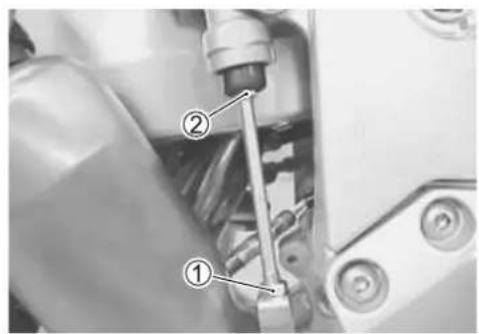 Technical diagram showing mechanical components with numbered labels ① and ② indicating parts of a device or assembly.