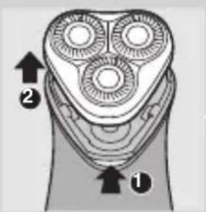 Diagram of a multi-pin electric shaver with labeled parts 1 and 2, showing internal gear teeth and mounting points.