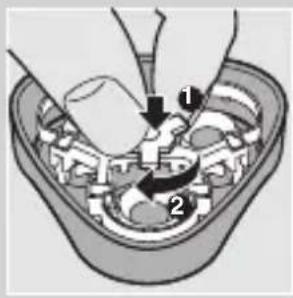 Diagram showing a mechanical or fluidic component with labeled parts and directional arrows indicating movement or flow.