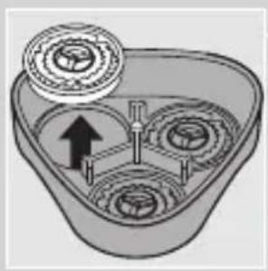 Diagram of a mechanical or electrical component with three circular components and an upward arrow, no visible text or symbols.