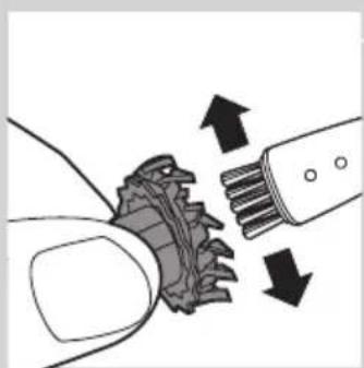 Diagram showing a hand holding a gear-like object with arrows indicating motion or force (no text or symbols)