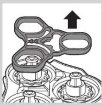 Mechanical assembly diagram showing gears and shafts with an upward arrow (no text or symbols)