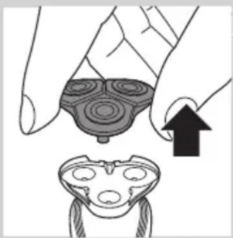 Illustration of a hand holding a circular object with concentric rings, being pointed at by an arrow (no text or symbols present)