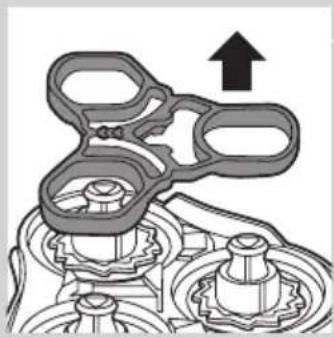 Mechanical assembly diagram showing gear and shaft components with an upward arrow (no text or labels)