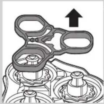 Mechanical assembly diagram showing gear and shaft components with an upward arrow (no text or labels)