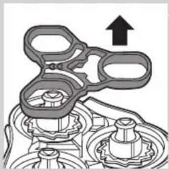 Mechanical assembly diagram showing gears and shafts with an upward arrow (no text or symbols)