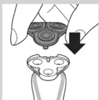 Illustration of a hand holding a device with a magnified view below showing internal components (no text or symbols)
