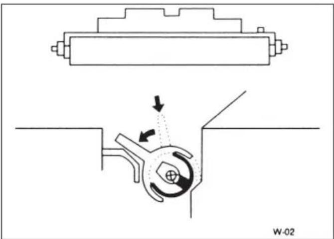 Technical diagram showing mechanical assembly with arrows indicating motion or force direction (no text or symbols)