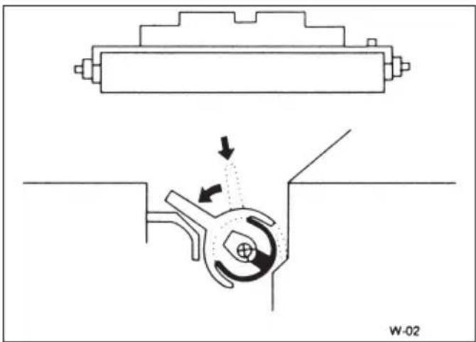 Technical diagram showing a mechanical assembly with directional arrows and a central component (no text or symbols)