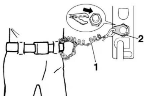Diagram illustrating a mechanical or electrical component with labeled parts and an inset showing a tool interacting with a connector.