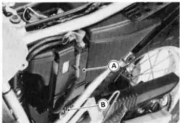 Technical diagram of a car's front engine compartment with labeled parts A and B