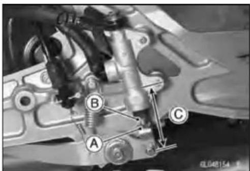 Technical diagram of a mechanical assembly with labeled parts A, B, and C, showing mechanical components and alignment indicators.