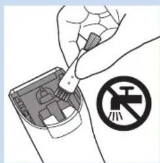 Illustration of a hand using a tool to clean or store electronic devices, with a no-smoking symbol nearby (no text or labels)