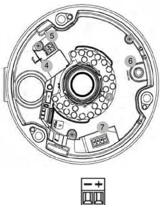 Technical diagram of a circular mechanical component with numbered parts and a legend indicating polarity indicators.
