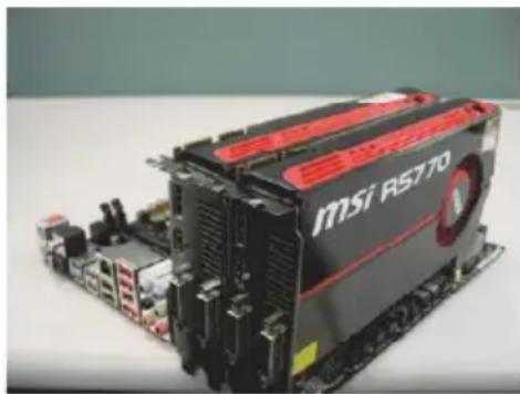 Exterior view of a black MSi RS770 processor unit with red ventilation slots (no visible text or symbols beyond branding)