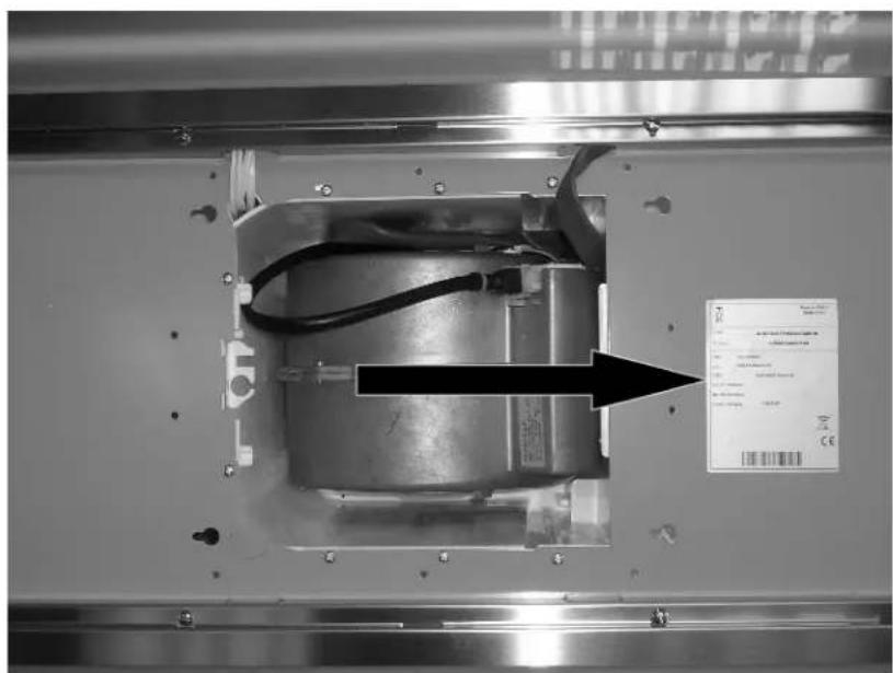 Technical diagram of an electrical component with a labeled specification box and arrow indicating assembly direction
