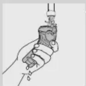 Line drawing of a hand holding a tool or device with a handle and connector (no text or symbols)