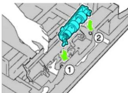 Technical diagram showing a mechanical assembly with labeled parts and directional arrows indicating movement or flow.