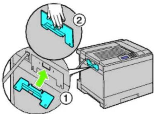 Diagram showing a hand placing a component into a device with labeled parts ① and ②, highlighting a green arrow indicating direction.