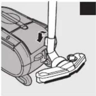Mechanical assembly diagram showing a vacuum cleaner inserted into a housing (no text or symbols visible)